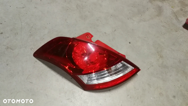 Lampa lewa tylna tył SPORT Suzuki Swift MK7 10-