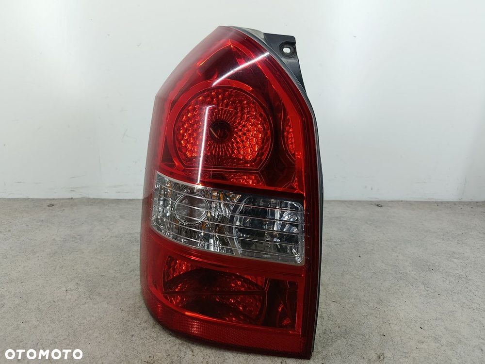 LAMPA TYLNA LEWA HYUNDAI TUCSON I 92401-2E0 - 1
