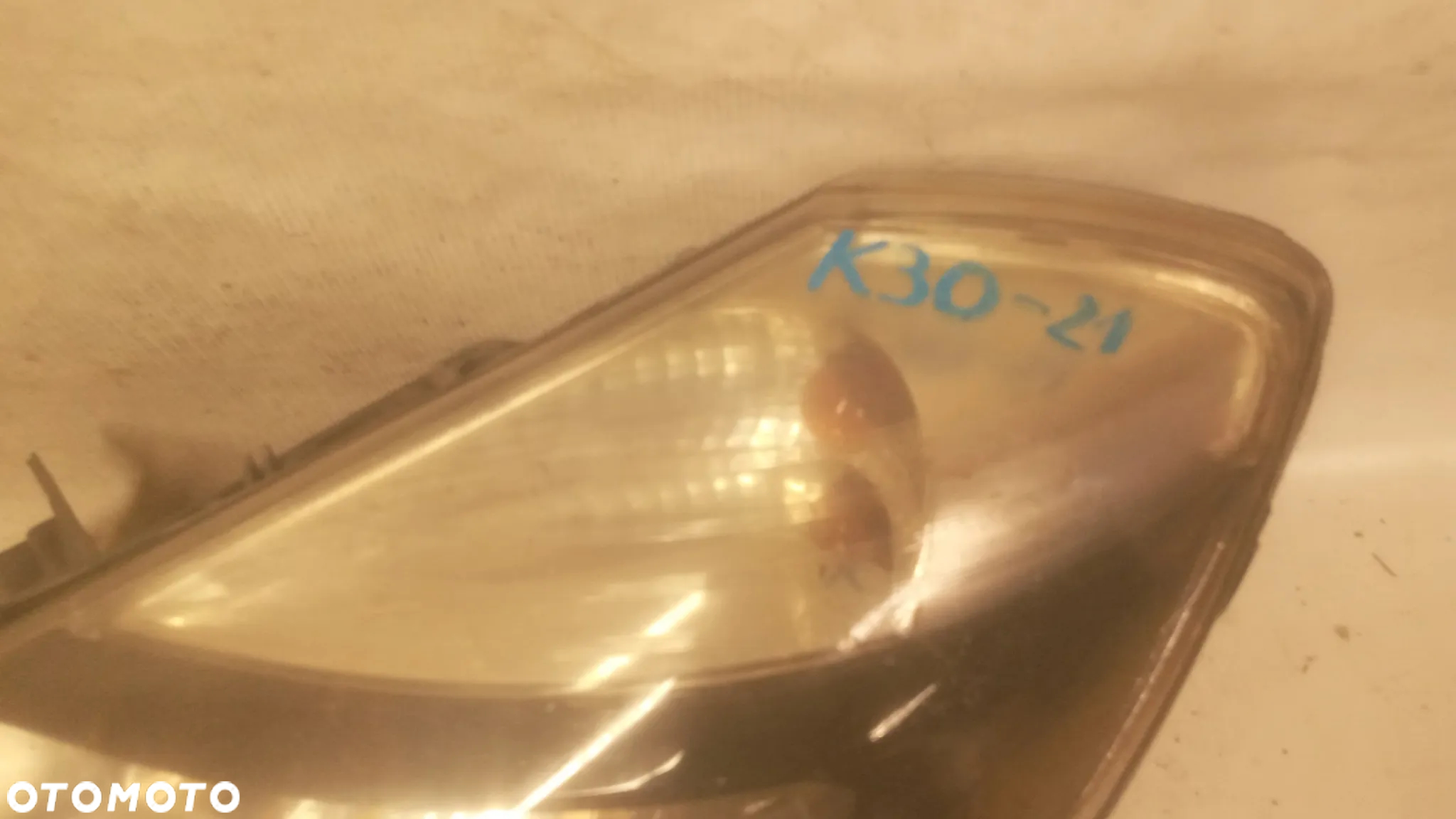 .  PRZOD PRZEDNIA LAMPA LEWA RENAULT CLIO III LIFT - 2