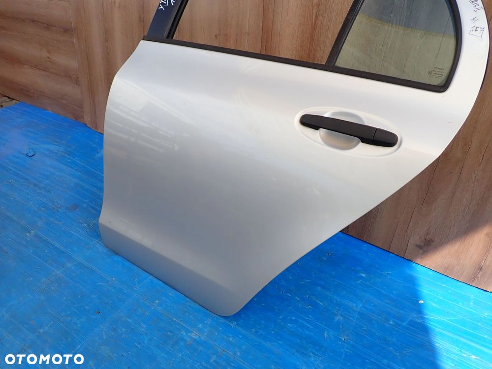 TOYOTA YARIS II 06-11 5d DRZWI TYLNE LEWE 1E7 - 3