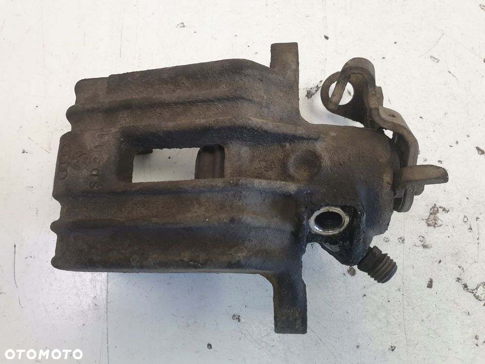 Skoda Octavia I ZACISK HAMULCOWY prawy TYŁ TYLNY - 1