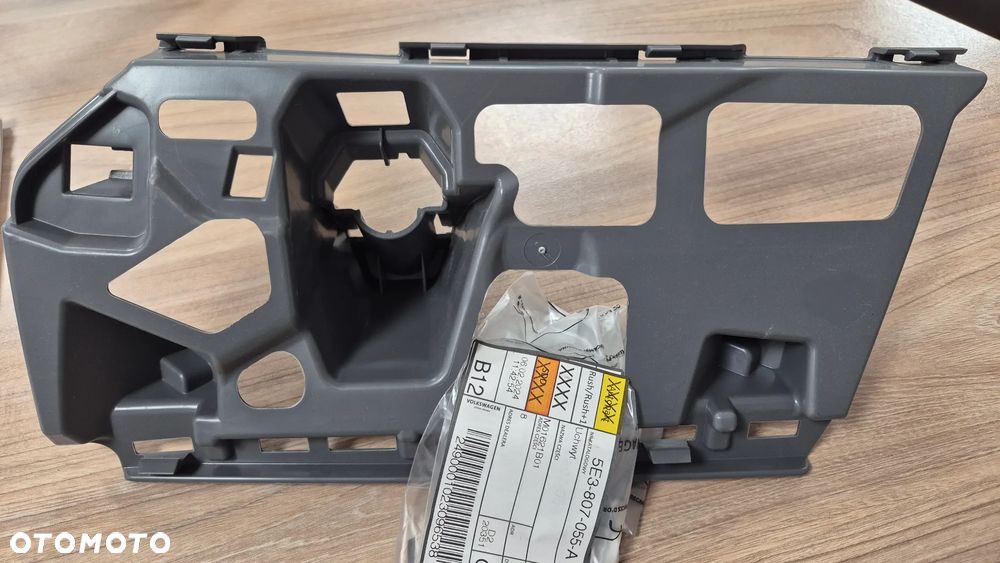 Uchwyt zderzaka lewy - 2