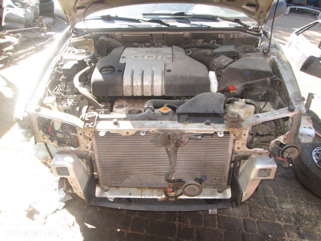 PÓŁOŚ MITSUBISHI CARISMA 00-04 1,8GDi PRAWA - 1