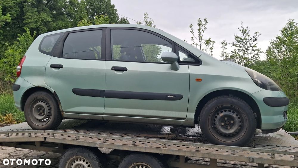 Na części Honda Jazz II Silnik 1.3 83KM L13A1 lakier G506M skrzynia automatyczna CVT maska zderzak drzwi klapa szyba fotel kanapa lusterko lampa deska GWARANCJA !!! Przód Tył Zestaw Komplet Drzwi Klapa Zderzak Błotnik Maska Grill Atrapa Szyba Pas Lampa Lusterko Boczki Fotel Kanapa Kokpit Deska Rozdzielcza Przełącznik Włącznik Sterownik Przewody Wiązka Instalacja Moduł Komputer Czujnik Listwa Pompa Alternator Wtryski Głowica Rozrusznik Kompresor Sprzęgło Dwumas Silnik Skrzynia ABS Klimatyzacji Paliwa Wspomagania Kolektor Turbina Przepustnica Zawór Chłodnica Koło Hak Belka Sanki Zawieszenie Mcpherson Półoś Amortyzator Wydech Tłumik Zacisk - 7