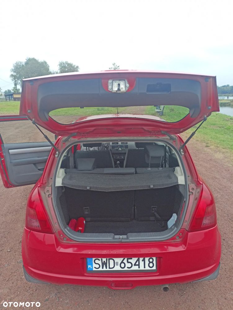 Suzuki Swift 1.3 Club - 12