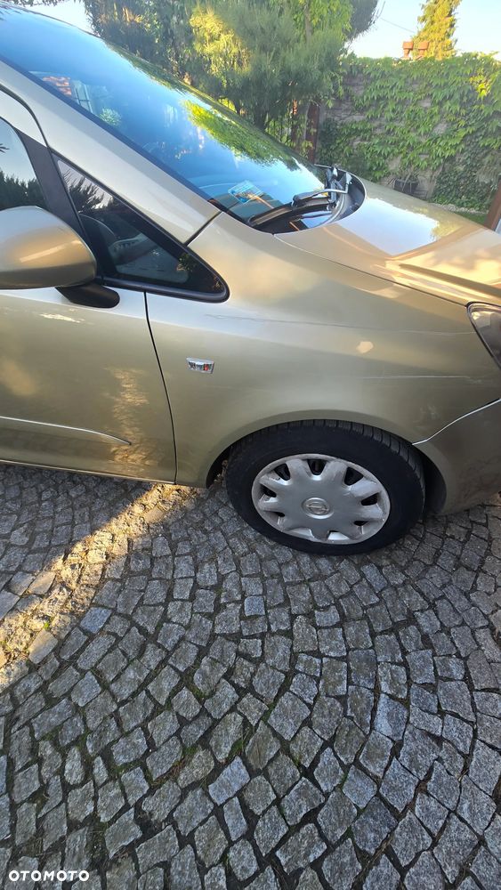 Opel Corsa 1.2 16V Cosmo - 8