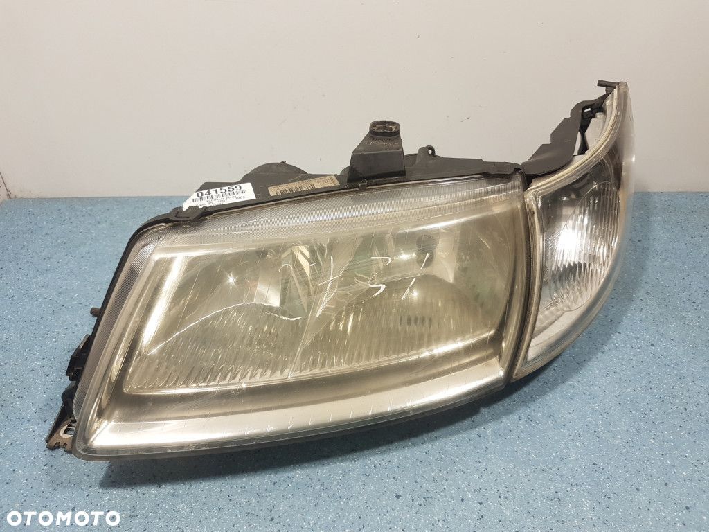 SAAB 95 I LIFT REFLEKTOR LEWY - 1