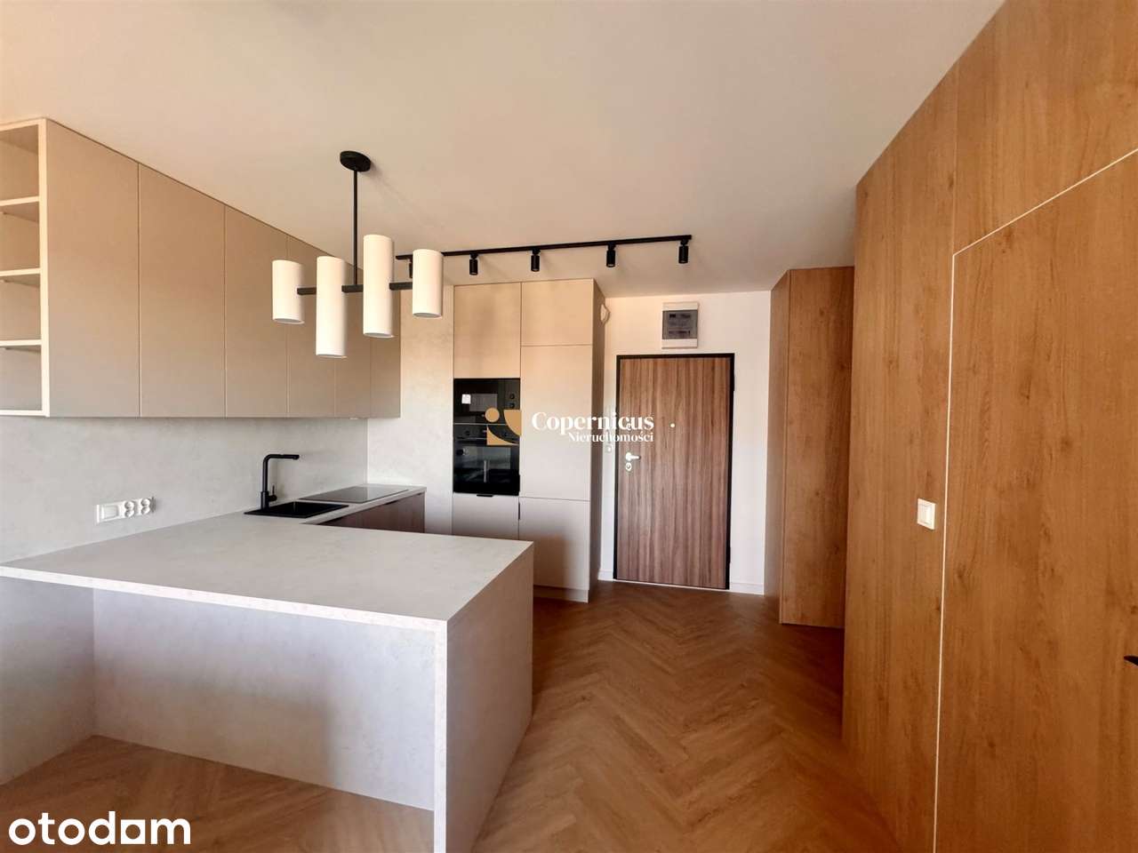 Nowocześnie wykończony apartament z ogródkiem
