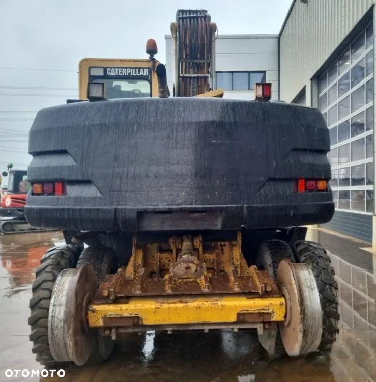 Caterpillar M312 - 4