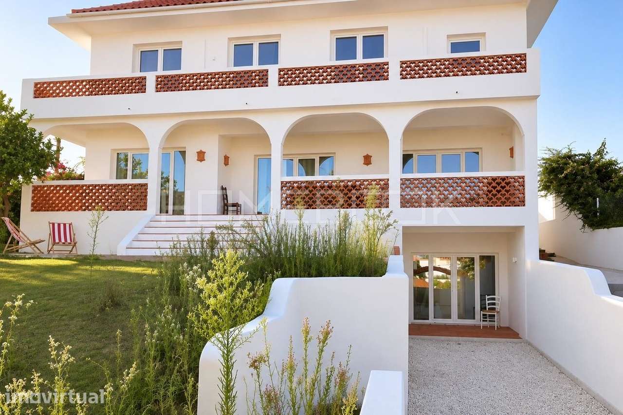 Moradia renovada com licença AL nas Quintinhas na Charneca da Caparica - Grande imagem: 5/31