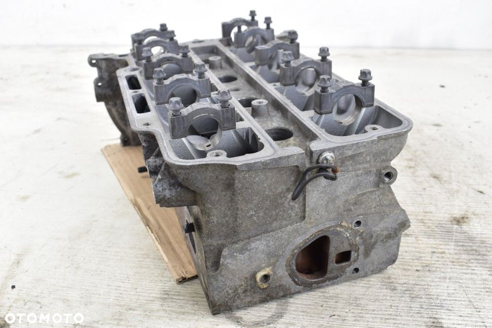 Głowica OPEL CORSA D ASTRA J MERIVA B 1.2 1.4 16V A12XER A14XER 55562229 - 9