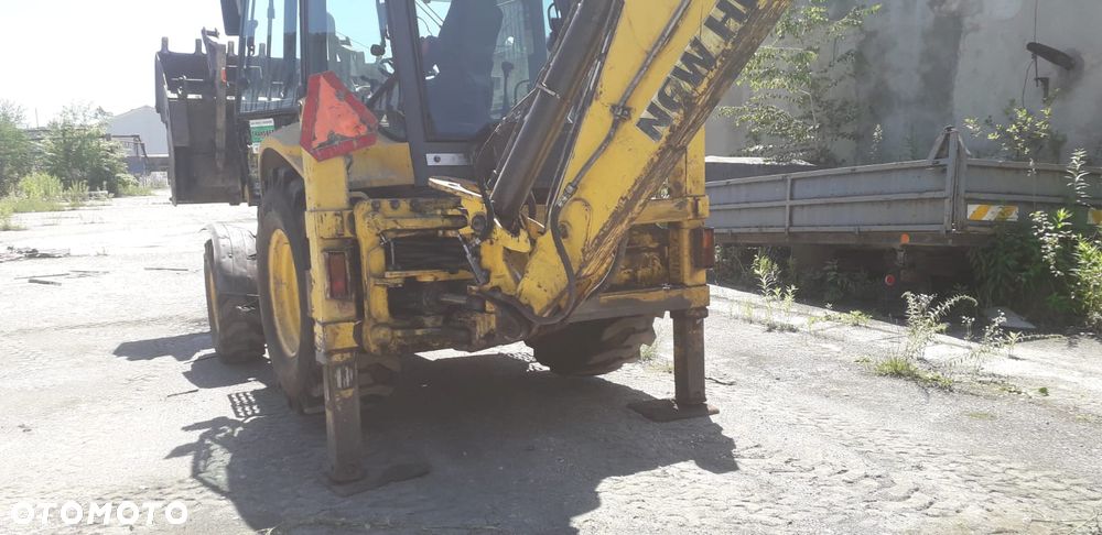 New Holland 110B - 4