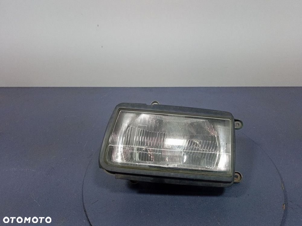 OPEL FRONTERA B REFLEKTOR LEWY LAMPA PRZEDNIA EU 1305235378 - 1