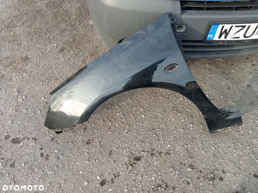 BŁOTNIK LEWY PRZÓD PEUGEOT 307 EXLD