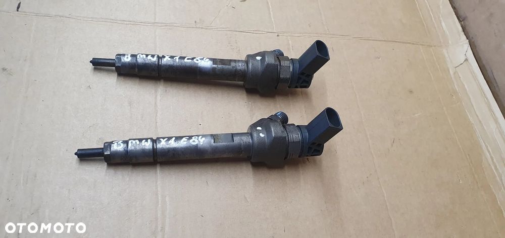 Wtrysk wtryskiwacz paliwa BMW X1 E84 Lift 2.0D 7810702 - 2