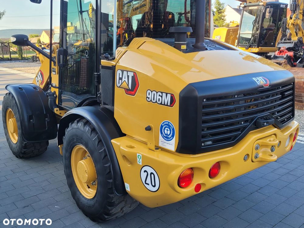 Caterpillar 906M / widły + łyżka otwierana / model 2022 r. / STAN IDEALNY / - 11