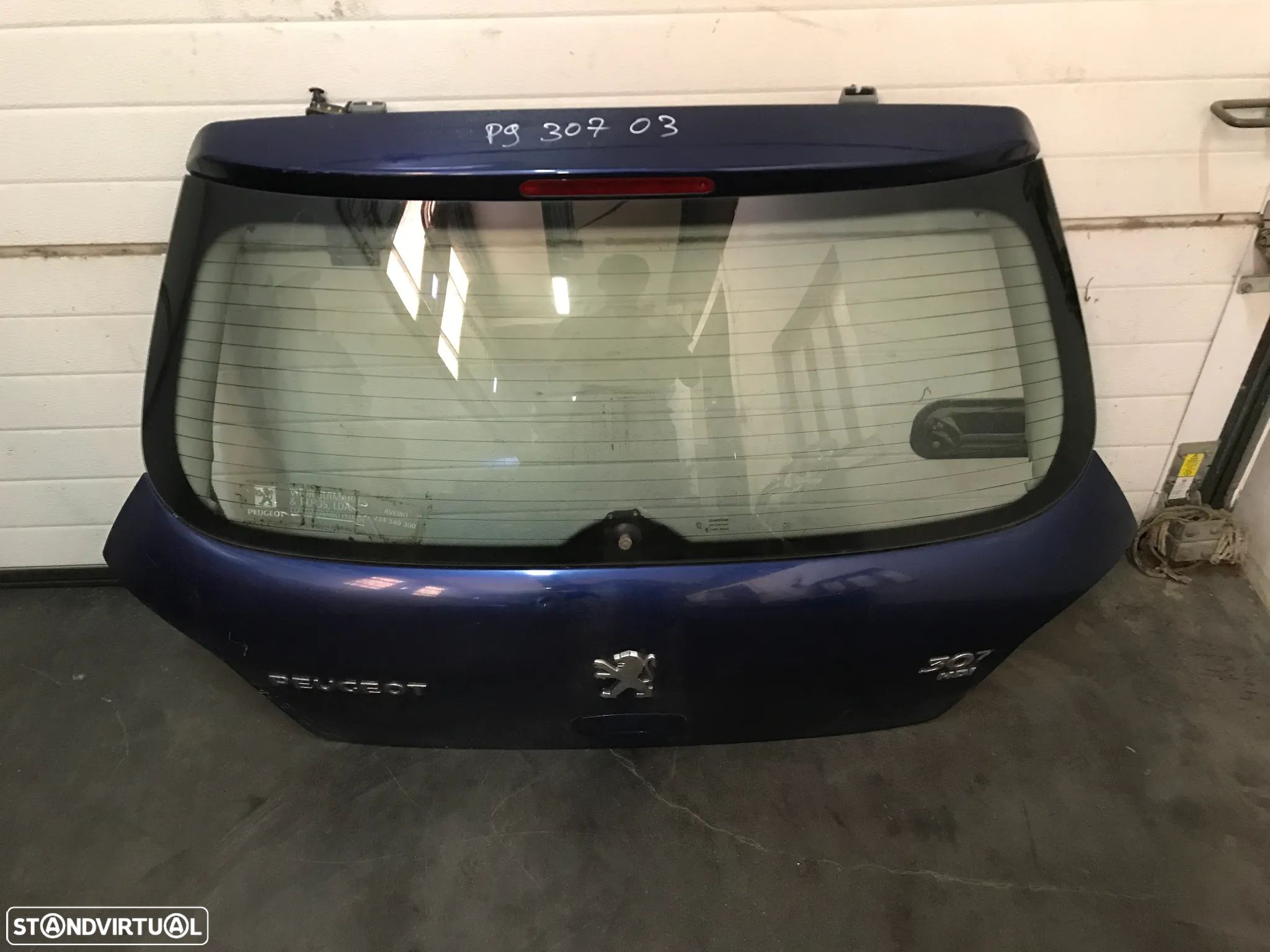 TAMPA DA MALA PEUGEOT 307 - 1
