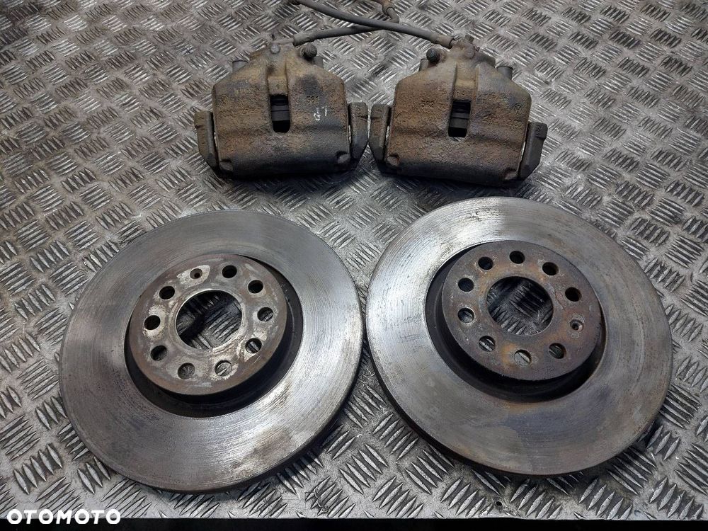 TARCZE HAMULCOWE PRZÓD + KLOCKI + ZACISKI VOLKSWAGEN PASSAT B6 2.0 TDI - 1