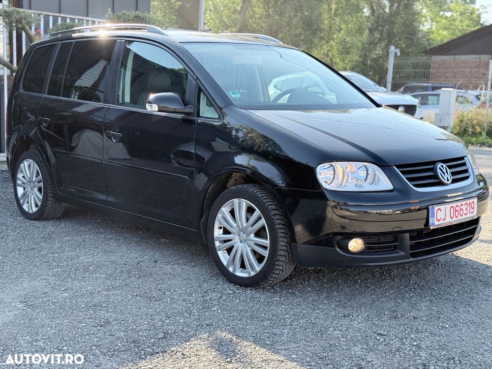 Volkswagen Touran 2.0 TDI DPF Highline DSG - 1