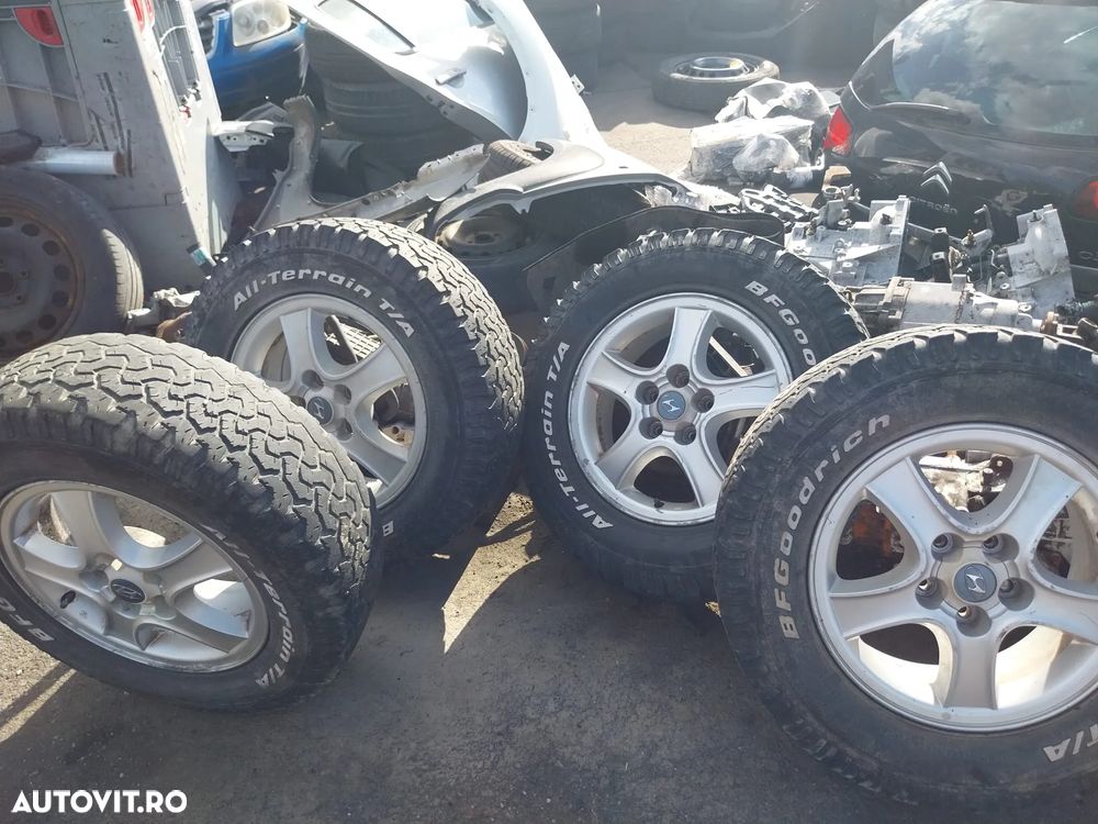 VAND SET DE JANTE CU ANVELOPE HYUNDAI SANTA FE 2001-2006, MARIME: 225/70/R16 IN 5 PREZOANE - 1