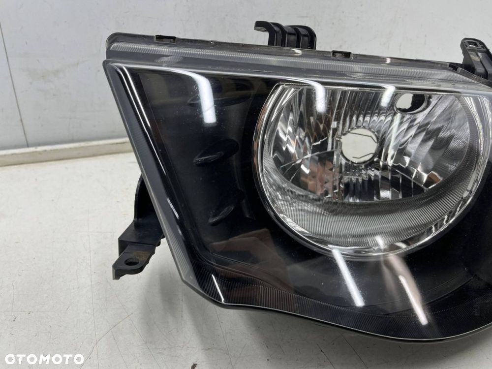 Lampa reflektor Mitsubishi L200 KA KB 05-10r. LEWA przednia H4 oryginalna lewy przód EU 8301b461 - 3