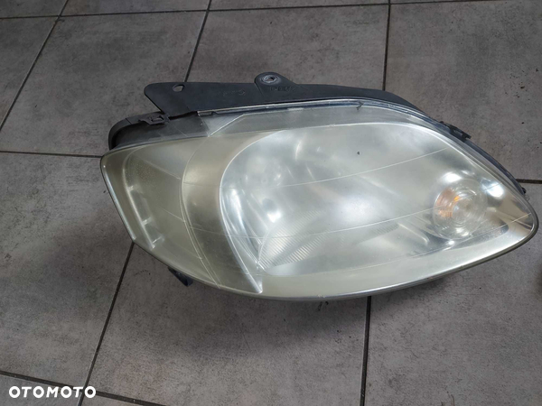 VW Fox lampa przednia FV transport/dostawa