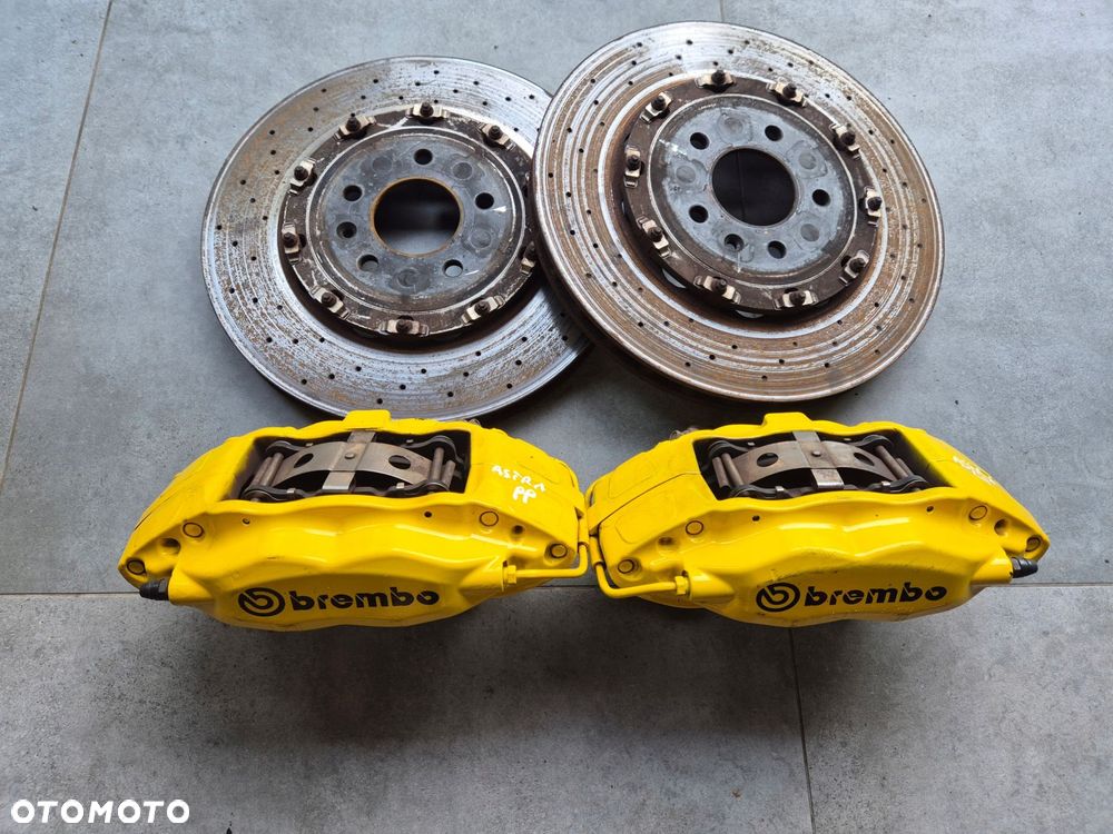 zacisk prawy lewy przod komplet opel astra j opc - 1