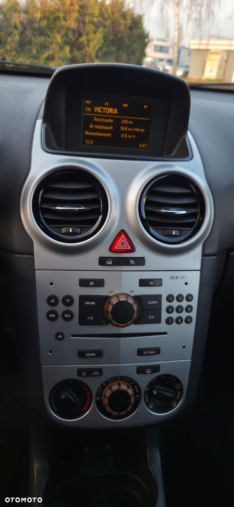 Opel Corsa 1.2 16V Enjoy - 24