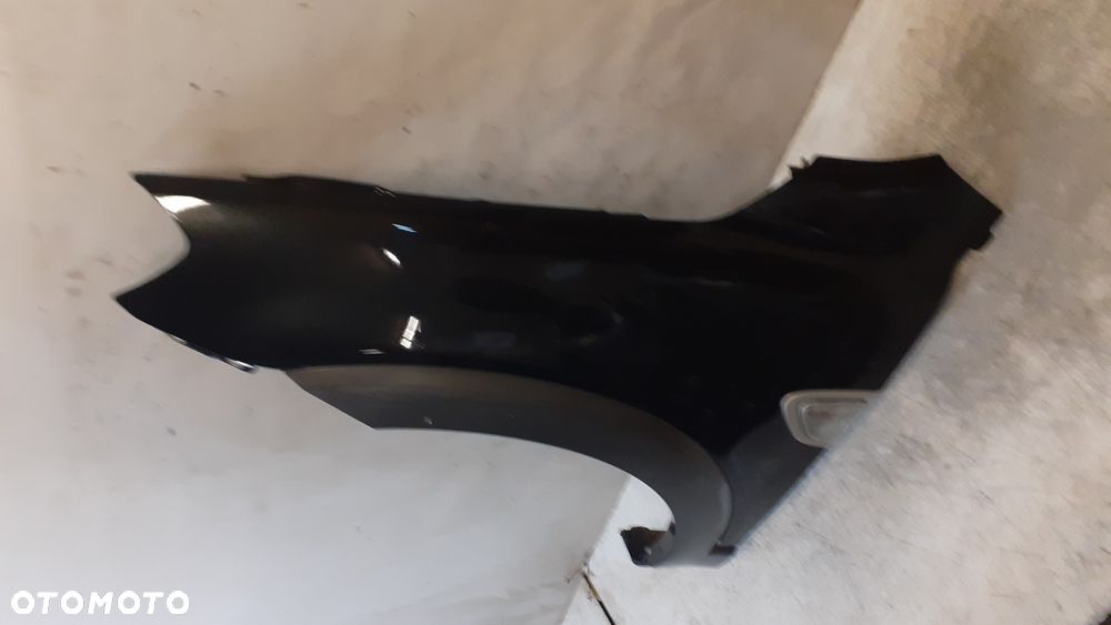 * Lewy przedni błotnik CHEVROLET CAPTIVA 2006-2010 CZARNY GAR - 2
