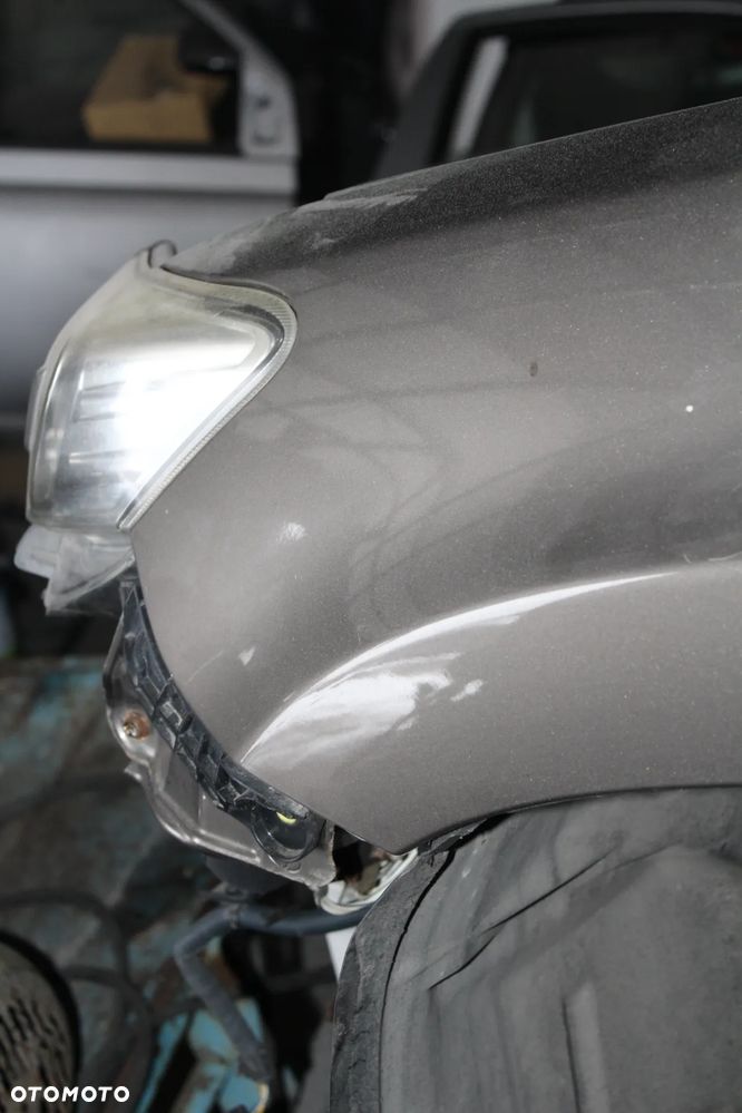 błotnik lewy przód toyota Rav 4 III lift kolor 4T3 - 4