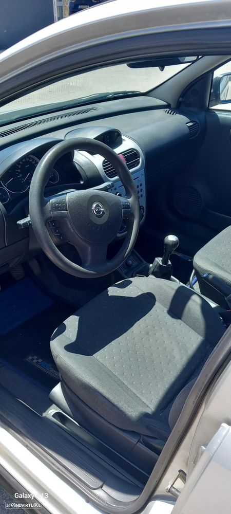 Opel Corsa 1.2 16V City - 11