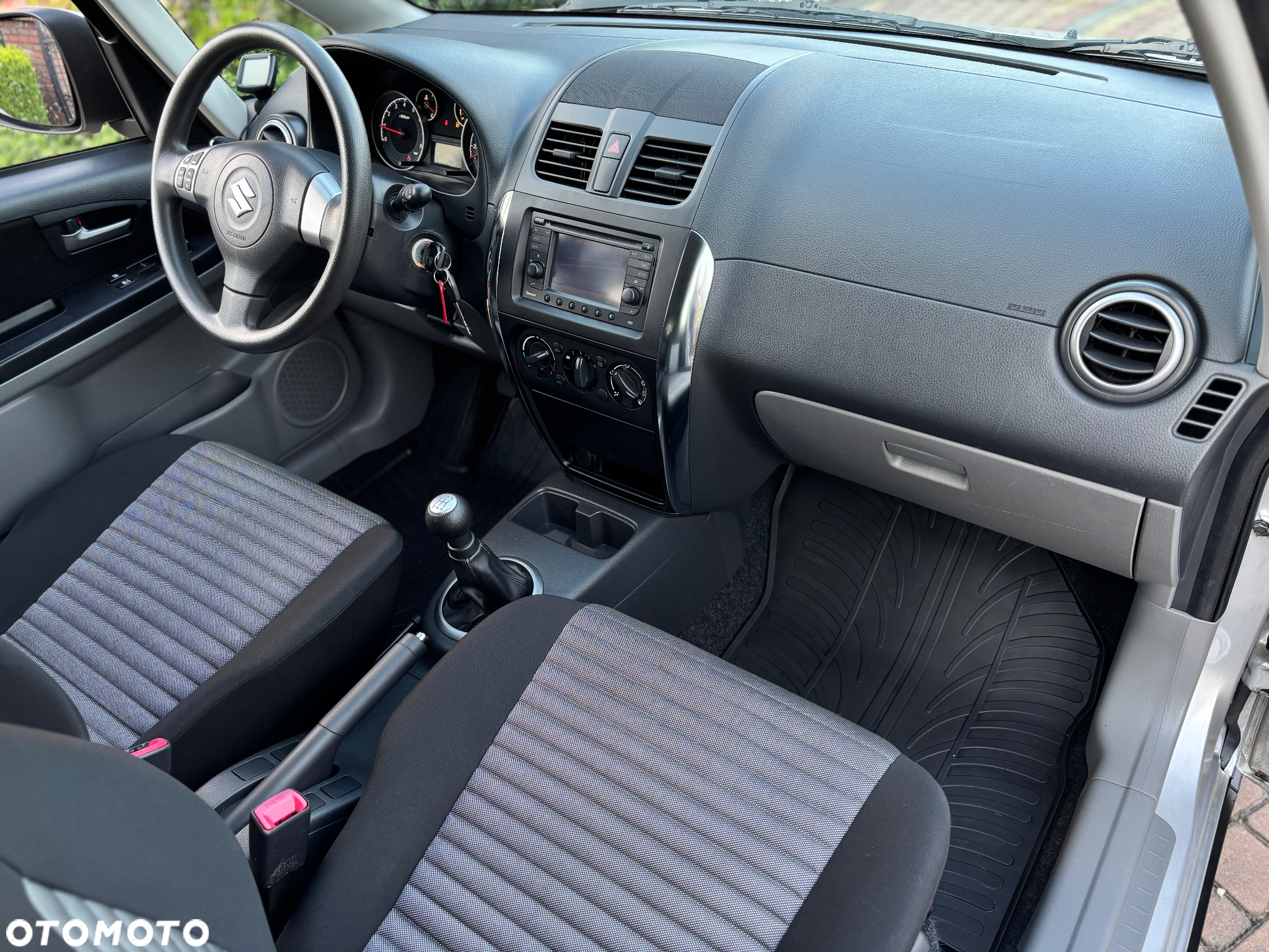 Suzuki SX4 1.6 Comfort Plus - 23