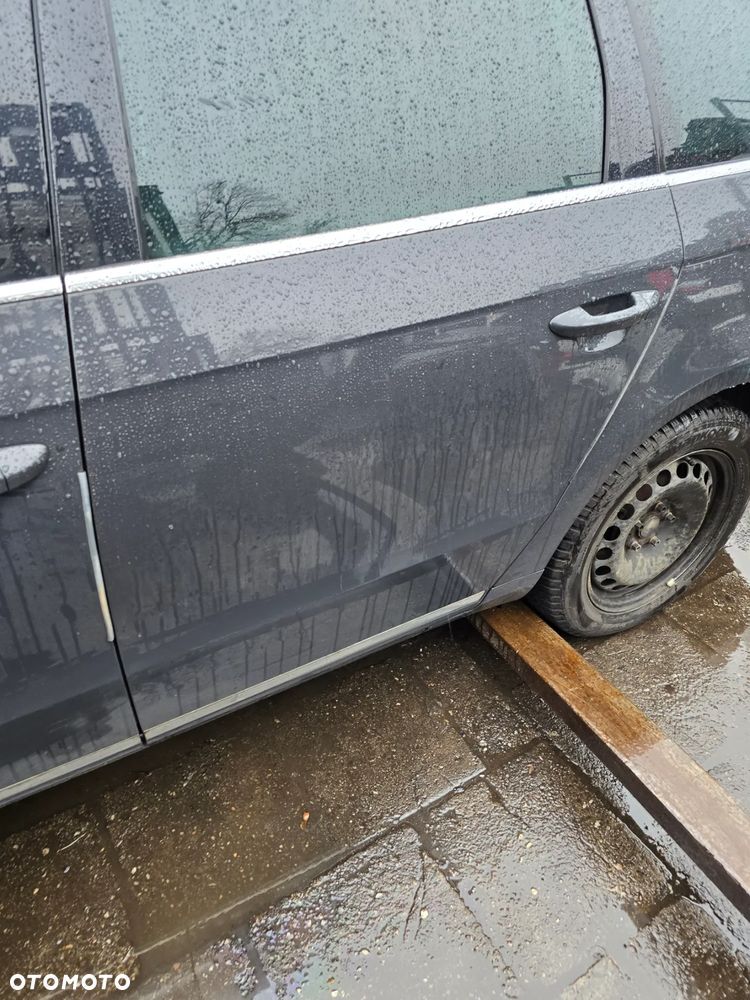 Drzwi lewy tył vw Passat B7 kombi w kolorze LI7F - 1