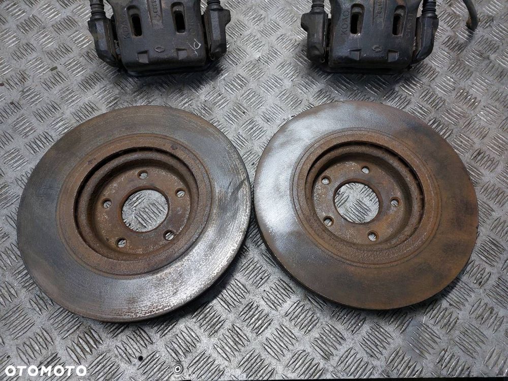 TARCZE HAMULCOWE PRZÓD + ZACISKI RENAULT KOLEOS I 2.0 DCI - 3