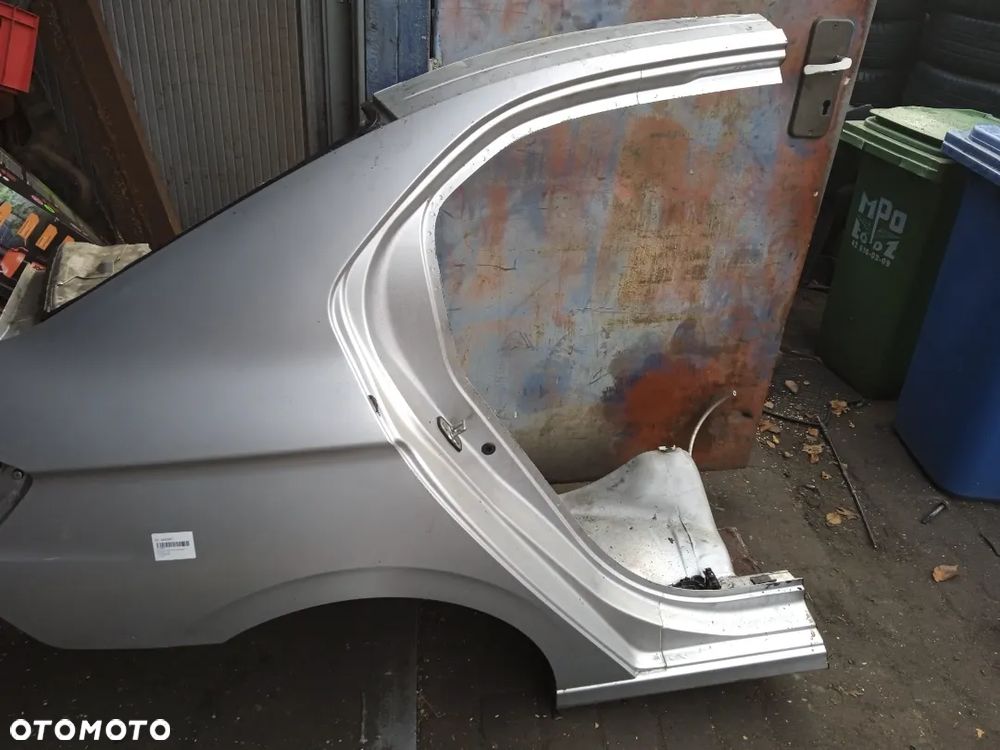 PEUGEOT 301 PRAWY BŁOTNIK TYLNY - 3