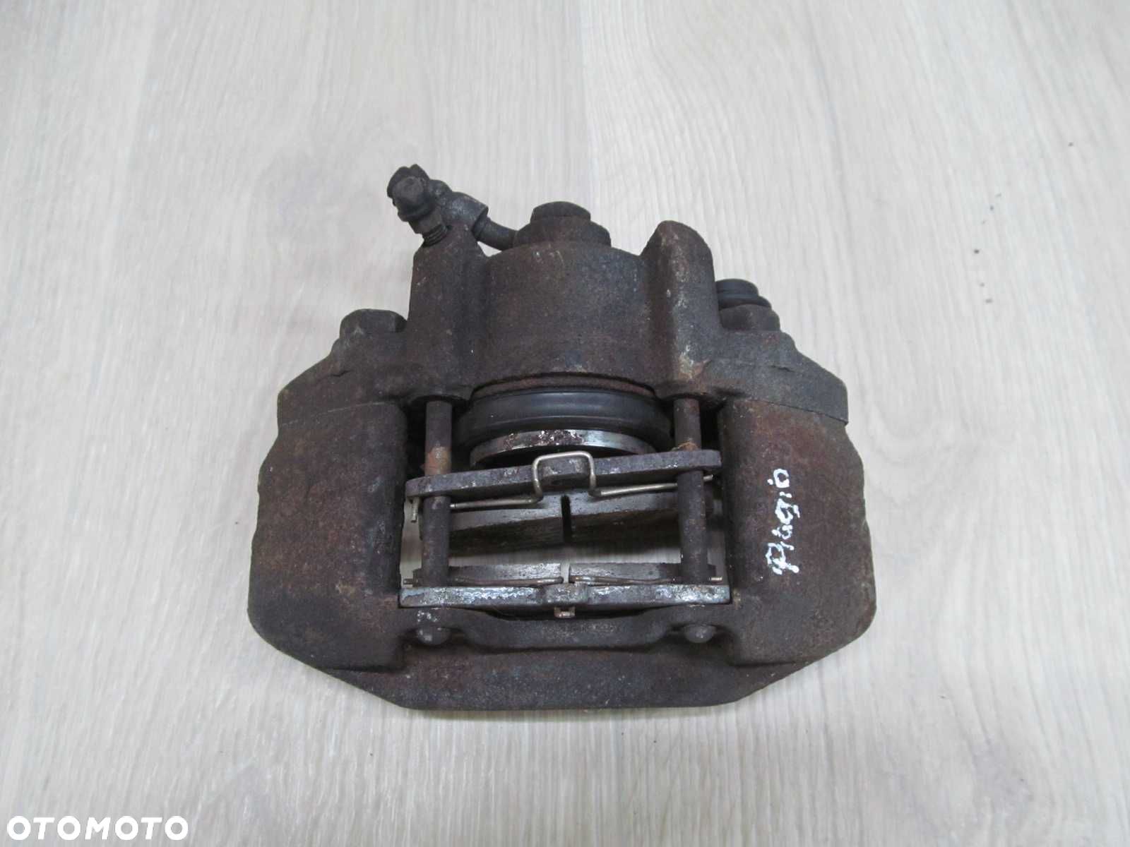 PIAGGIO PORTER HIJET PFAU 1.3 06- ZACISK HAMULCOWY PRZOD PRAWY - 1