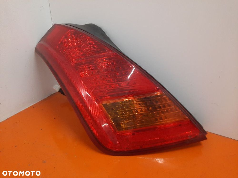 NISSAN MURANO I Z50 03-08 LAMPA LEWY TYŁ LEWA TYLNA ZEWNĘTRZNA 22063779 - 1