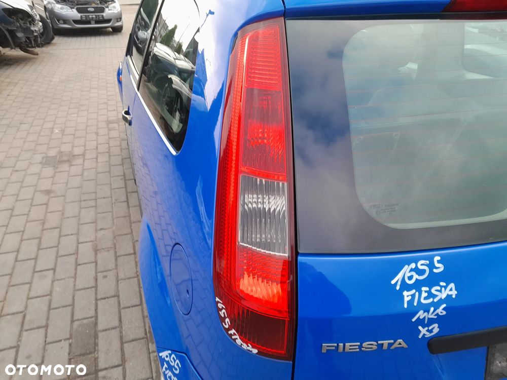 FORD FIESTA MK6 LAMPA LEWA TYLNA LEWY TYŁ W BŁOTNIK - 1