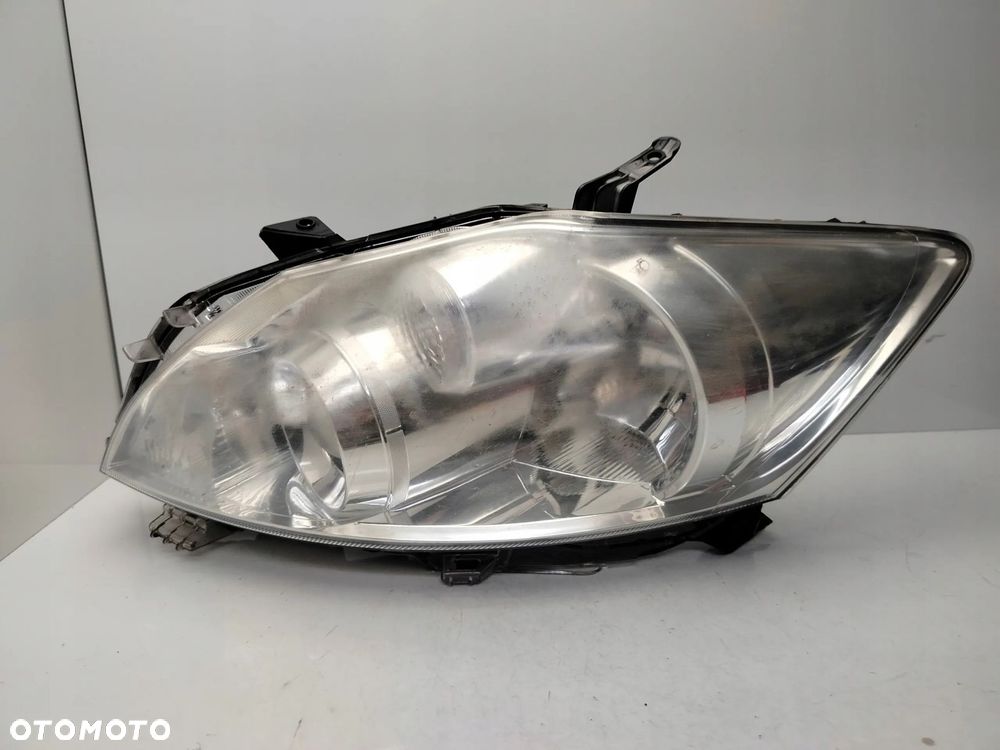 TOYOTA AURIS I LIFT 09R- REFLEKTOR LAMPA LEWY PRZÓD LEWA PRZEDNIA - 1