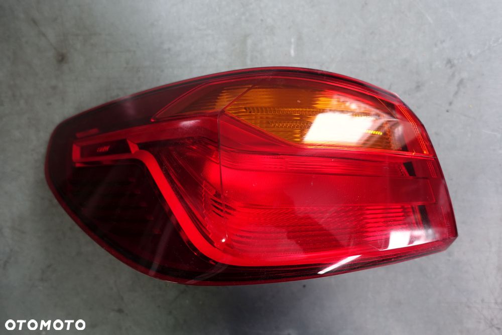 LAMPA LEWY TYŁ BMW F40 - 1
