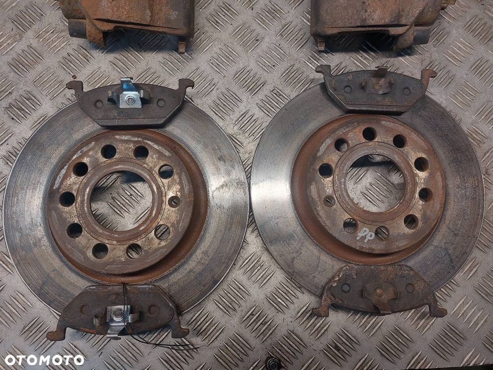 TARCZE HAMULCOWE PRZÓD + KLOCKI + ZACISKI SKODA OCTAVIA II LIFT 1.9 TDI - 2