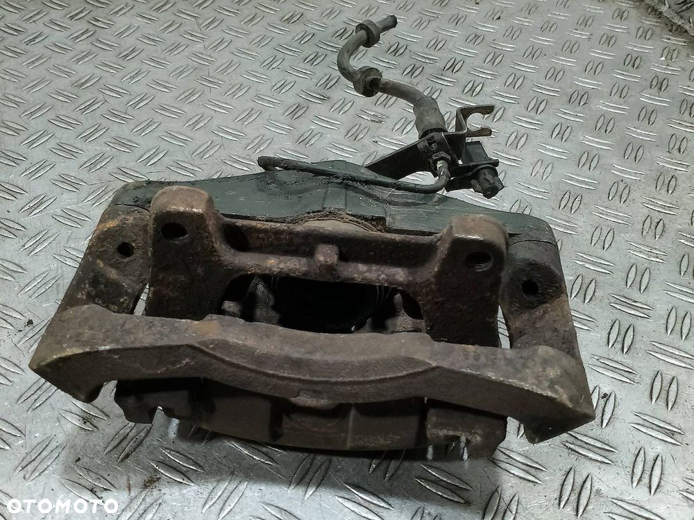 ZACISK HAMULCOWY LEWY PRZÓD AUDI A6 C6 3.2 V6 FSI - 4