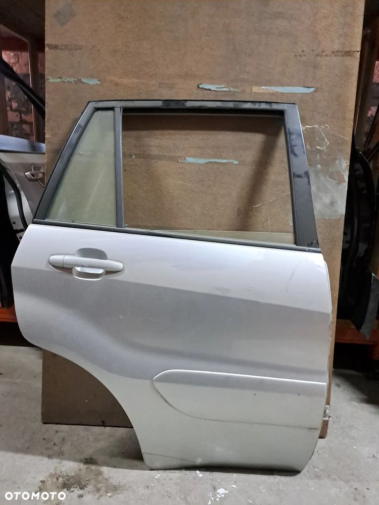 Drzwi Toyota RAV-4 | RAV4 II prawy tył (jasny srebrny) - 1
