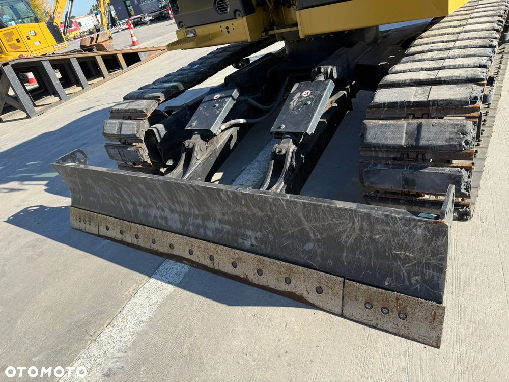 Caterpillar 310 - 24