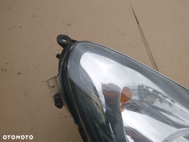LAMPA PRAWY PRZÓD PRAWA PRZEDNIA OPEL CORSA D 06-11 - 12