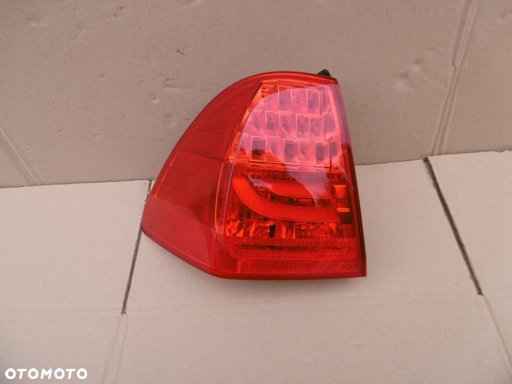 lampa tył tylna lewa bmw e91 lci lift polift w błotnik 7289431 - 1