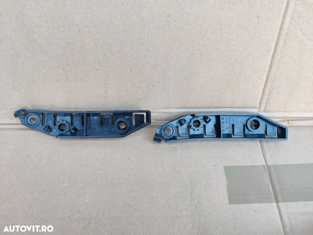 Suport plastic montare prindere bara fata pe aripa stanga dreapta NOI TESLA Model 3 1084182-00-E / 1084181