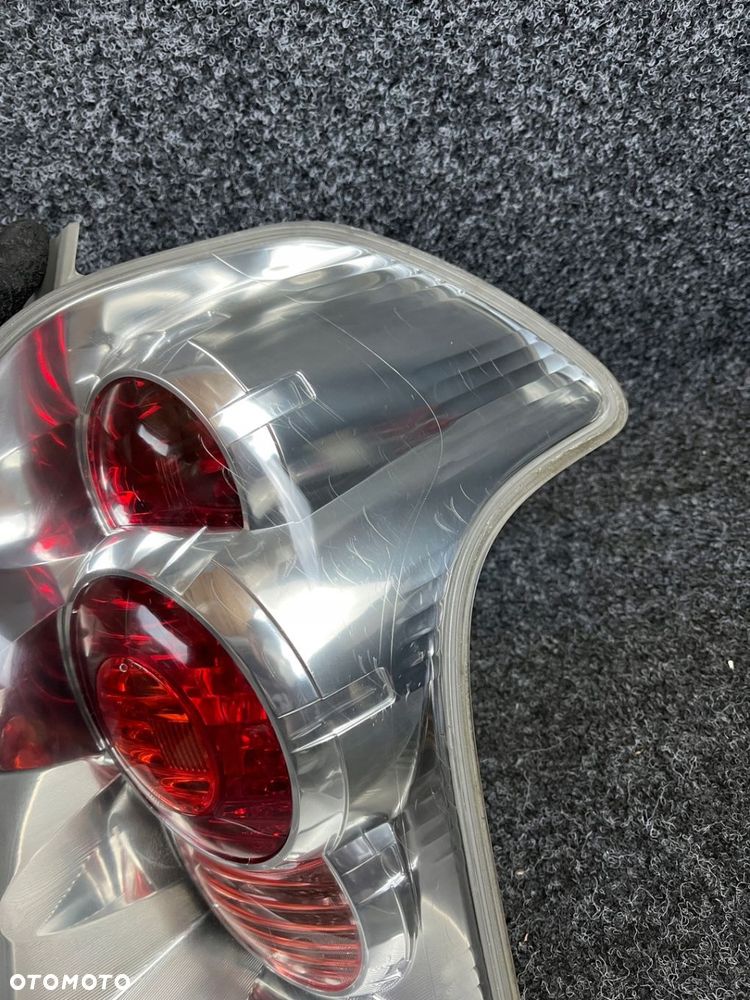 toyota corolla verso II lampa lewy tył tylna - 12