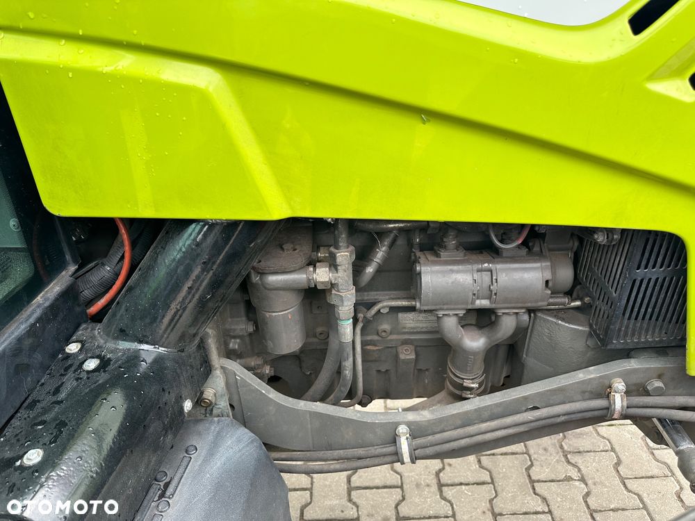 Claas Axos 320 - 8