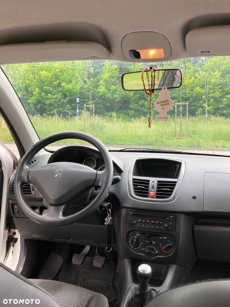 Peugeot 206 plus 60 - 11
